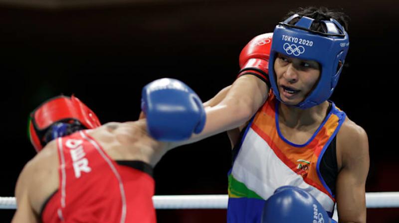 Indian boxer Lovelina reaches Olympic quarterfinals