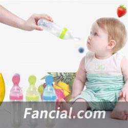 When do babies hold their own bottle?