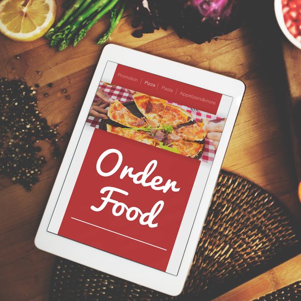 What are the benefits of using an online pizza ordering system?