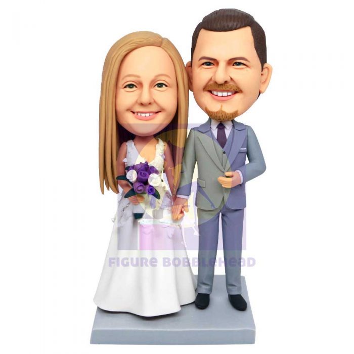 Sweet Couple Holding Purple Flowers Custom Wedding Bobbleheads Cake Topper