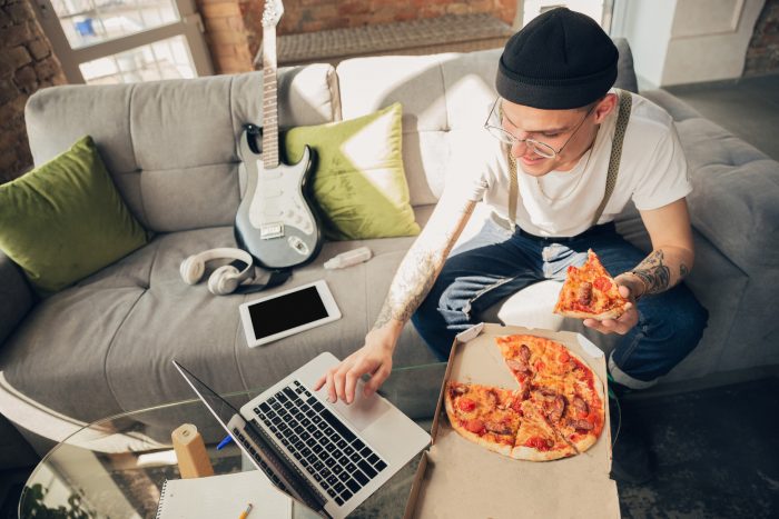 How can pizza ordering systems improve efficiency for restaurants?