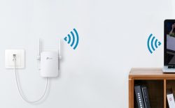 How do I access the TP-Link extender setup page?