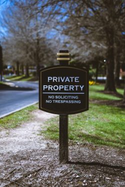 Foreclosure Reality Sign in Front of Modest Home