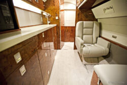 Luxurious Aircraft Interior Featuring Premium Wood Veneer Finish